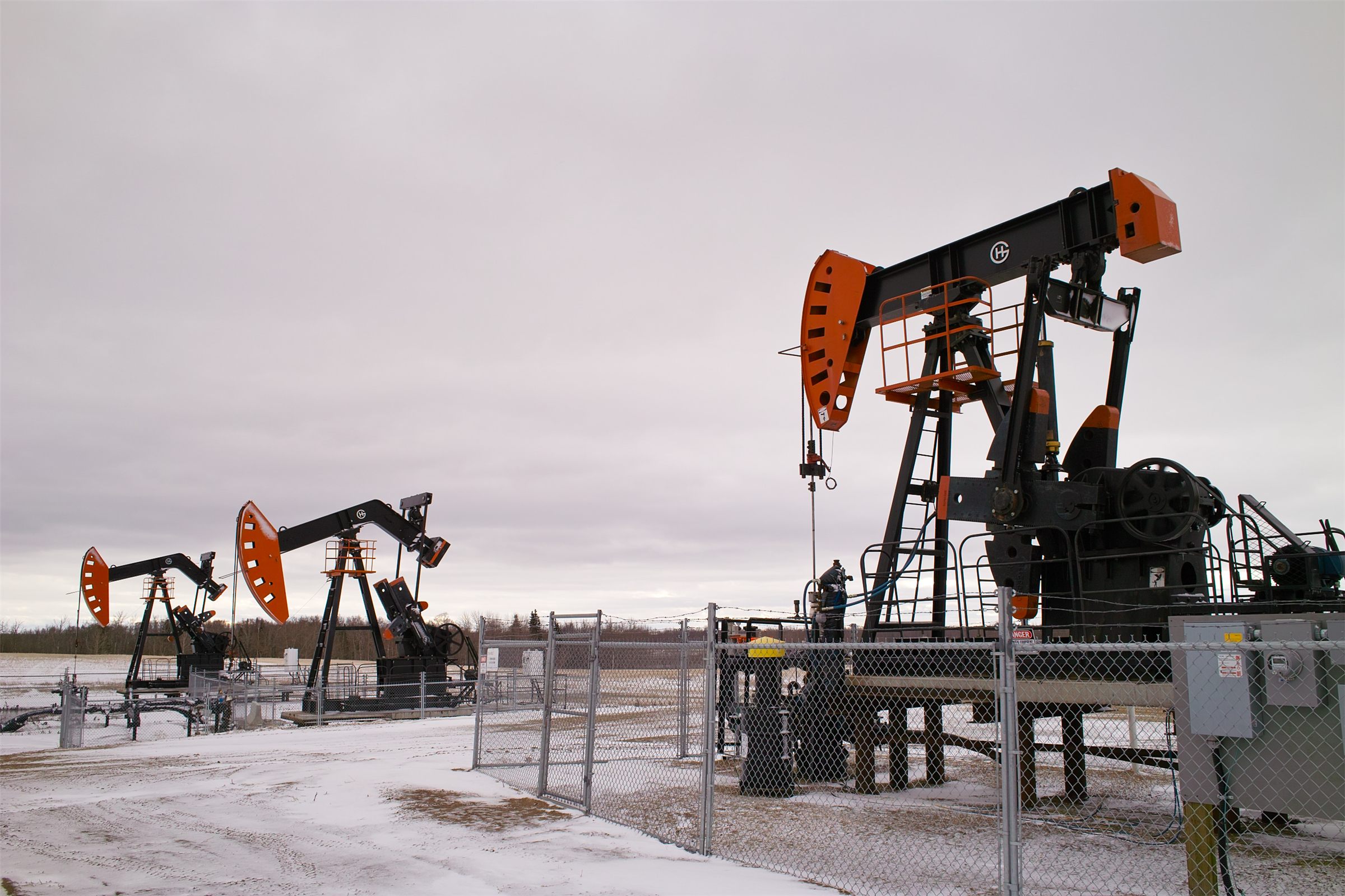 Pumping units on a snow-covered oilfield